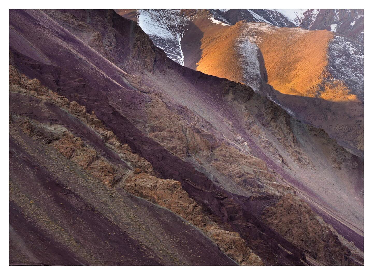 Layered mountains, vibrant orange and purple layers